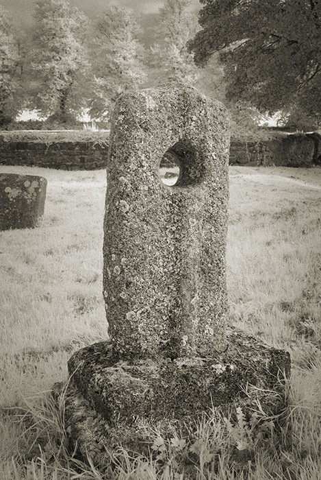 Holed cross stone