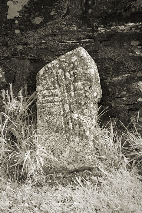 Cross inscribed stone
