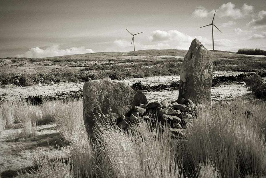 Ballymagaraghy Standing Stones with wind turbines in the background