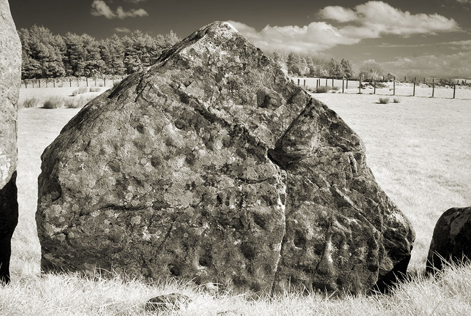 Cup marked triangle stone at Beltany stone circle